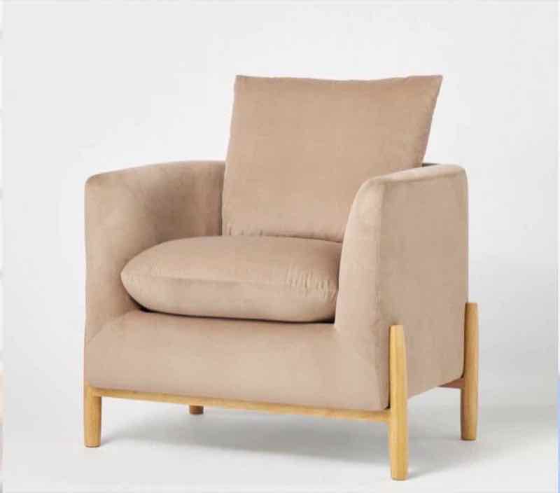 Tan velvet accent armchair with natural wood legs