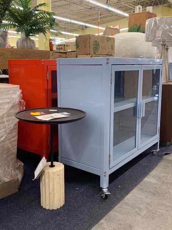 Grey metal cabinet with glass doors
