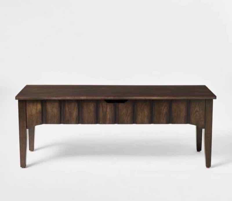 Walnut-finish solid wood coffee table with slatted apron
