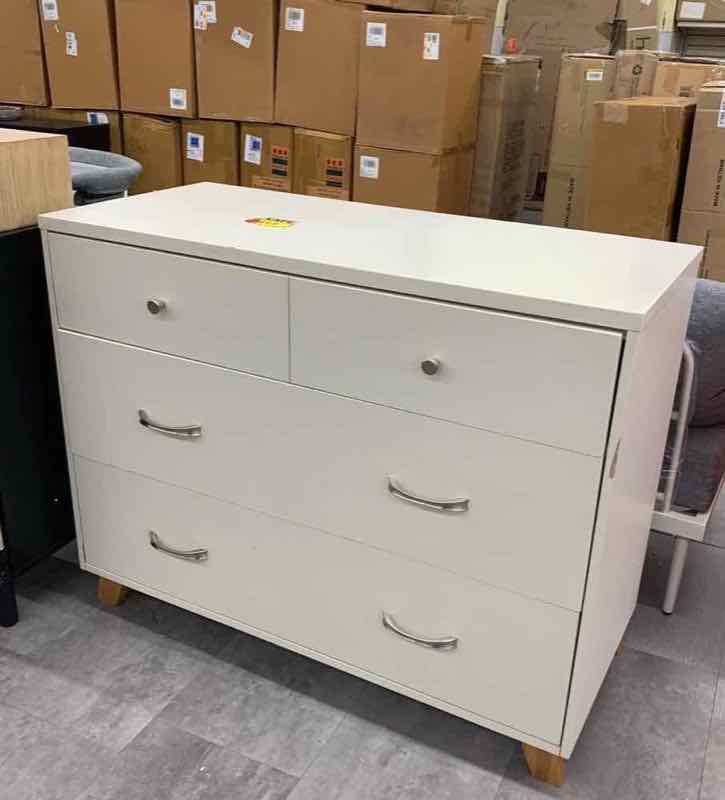 White four-drawer dresser