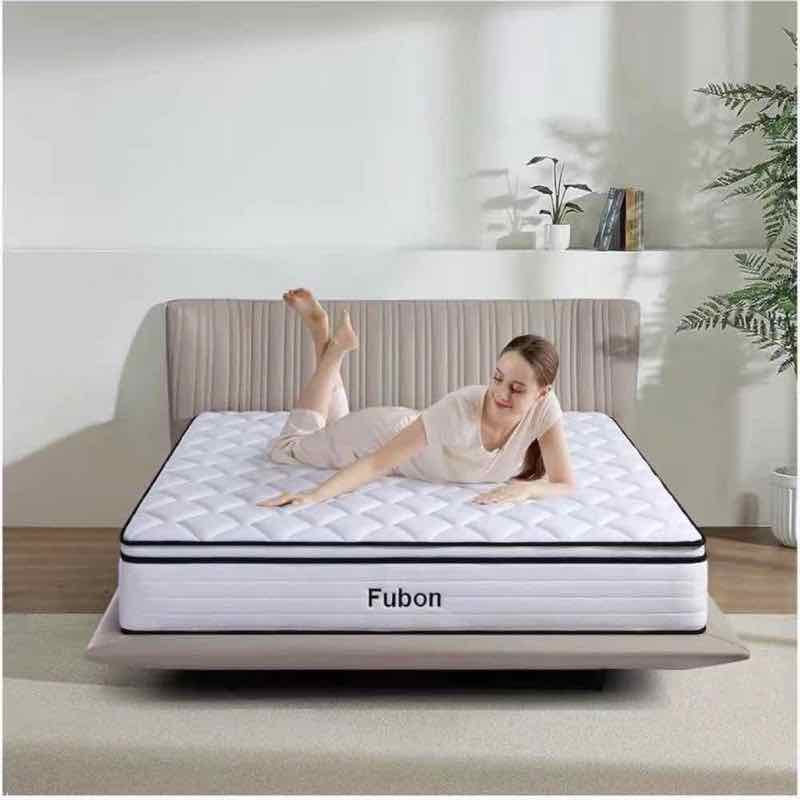 Fubon quilted hybrid pillow-top mattress on an upholstered bed frame