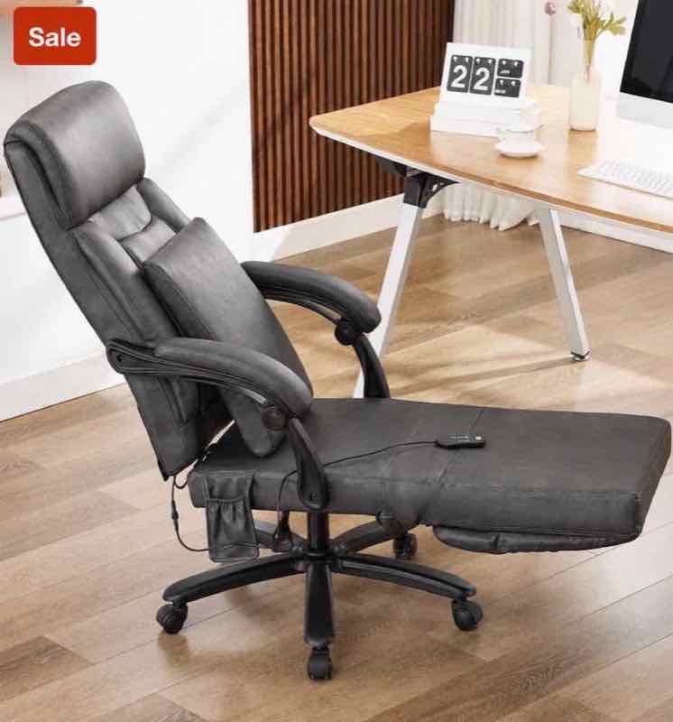 Grey reclining office chair with footrest