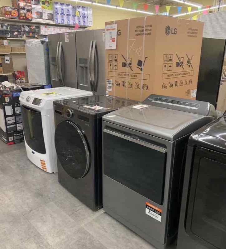 Washer, dryer and refrigerators on the appliance floor